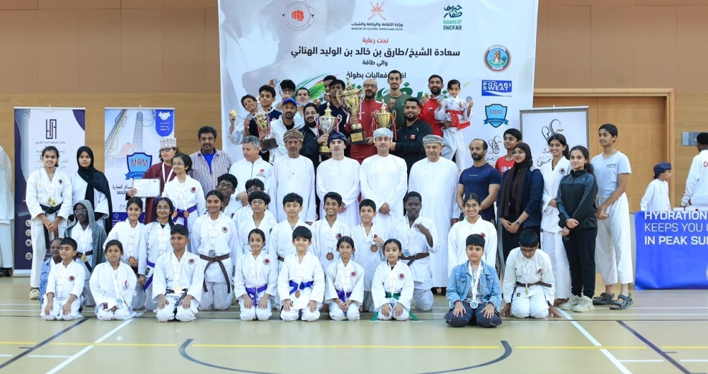 A group photo of the winning contestants in the championship.
