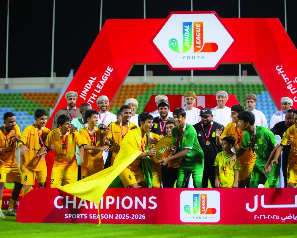 Seeb players celebrate together after being crowned champions of the inaugural Under-15 competition.