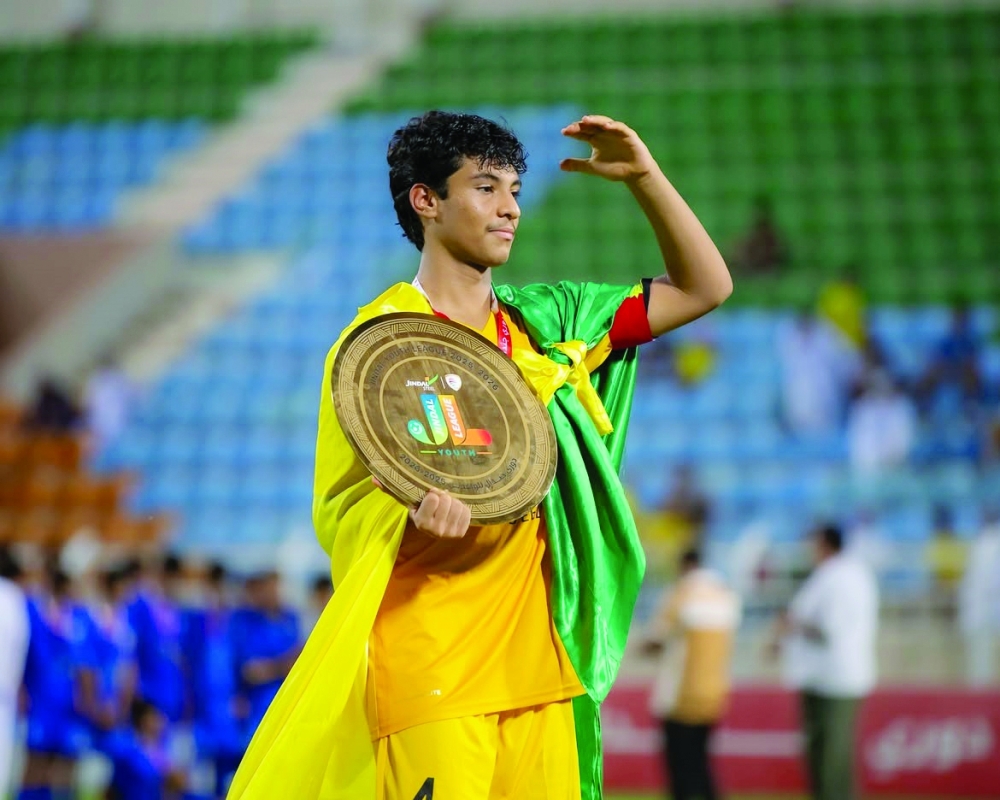 Al Seeb captain Muadh al Mahrami lifts the Jindal Youth League shield after the final at Al Seeb Sports Stadium.