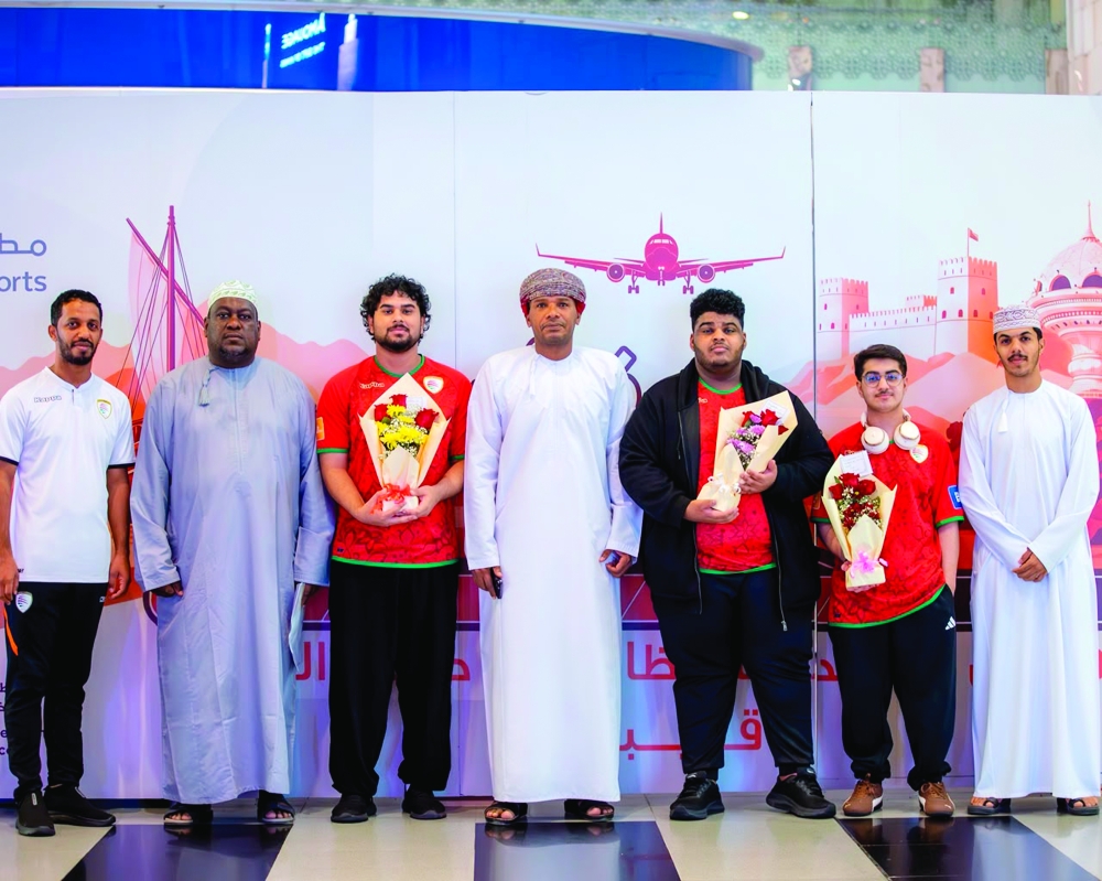 Oman esports team members during a reception after qualifying for the 2026 World Cup finals.
