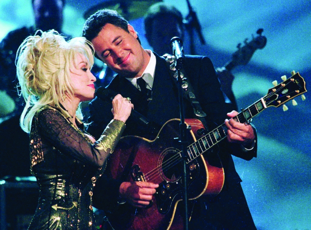 Dolly Parton and Vince Gill perform at the Country Music Awards in Nashville.