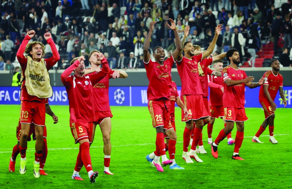 LASK's Art Smakaj and teammates celebrate qualifying for the league phase of the Uefa Champions League. — Reuters