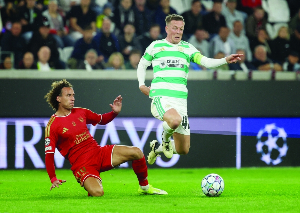 Celtic's Callum McGregor in action with LASK's Robert Ljubicic. — Reuters