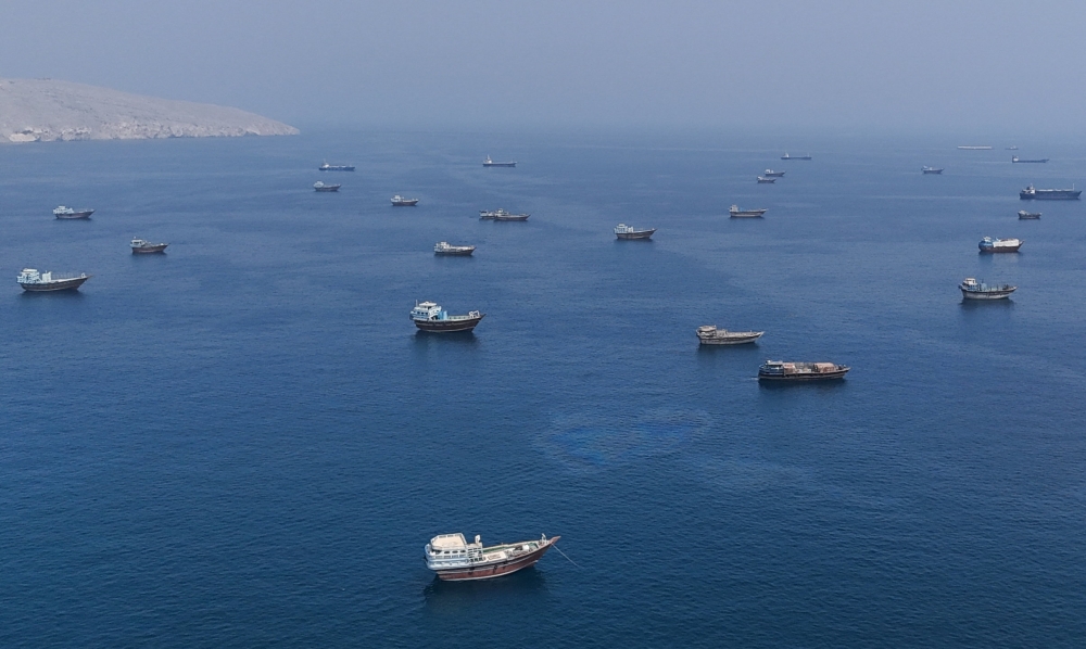 A drone view shows vessels near the Strait of Hormuz, as seen from Musandam, Oman, August 28, 2026.
