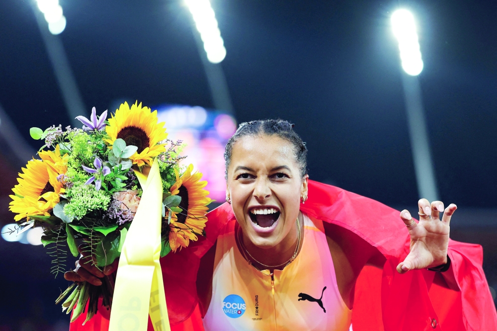TOPSHOT - Switzerland's Audrey Werro celebrates after winning the women's 800m during the IAAF Diamond League athletics meeting, at the Letzigrund Stadium, in Zurich on August 27, 2026. (Photo by Stefan Wermuth / AFP)
