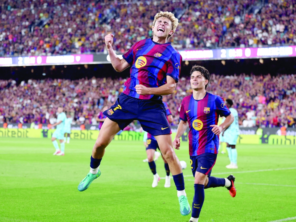 Barcelona's Spanish midfielder #07 Fermin Lopez celebrates scoring his team's second goal during the Spanish league football match between FC Barcelona and Athletic Club Bilbao at Camp Nou Stadium in Barcelona on August 27, 2026. (Photo by Josep LAGO / AFP)
