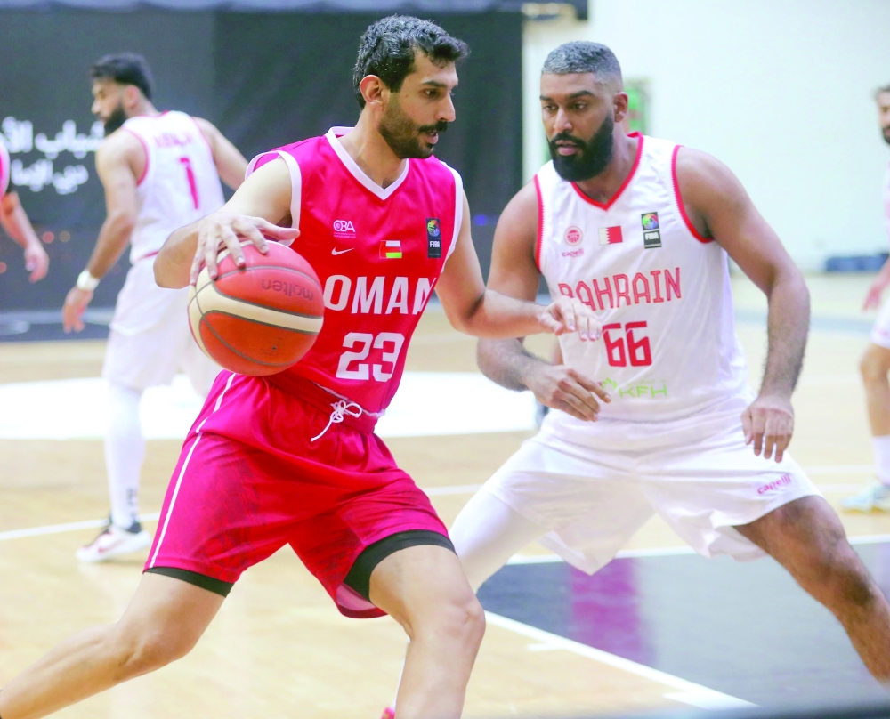 Oman and Bahrain players in action. — Faiza al Balushi