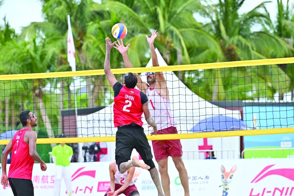 Oman volleyball beach team in action.