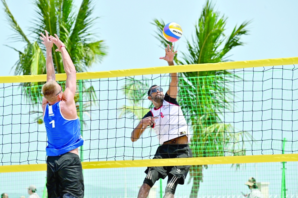Oman volleyball beach team in action.