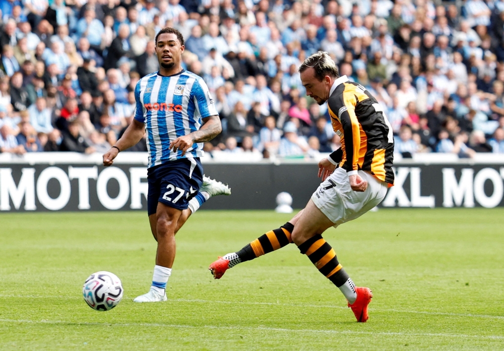 Hull City's Liam Millar scores their first goal against Coventry City. — Reuters