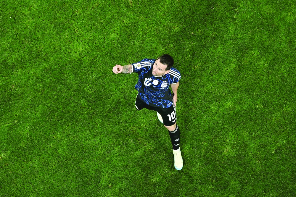 Lionel Messi celebrates after his team won the 2026 World Cup football tournament semi-final