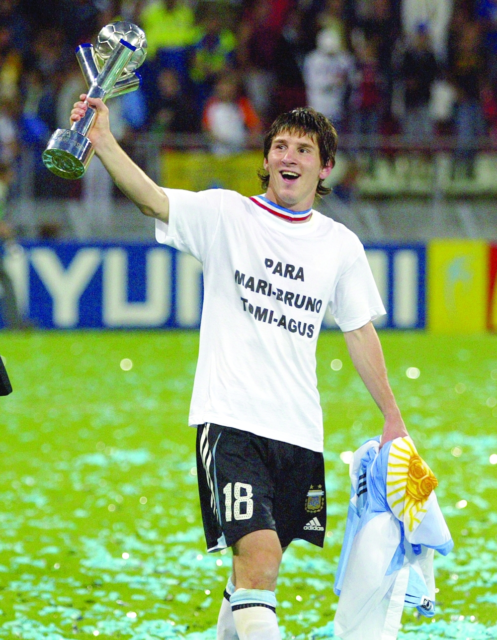 Messi holds the trophy after the final football match against Nigeria for the FIFA World Youth Championship in Utrecht, Netherlands