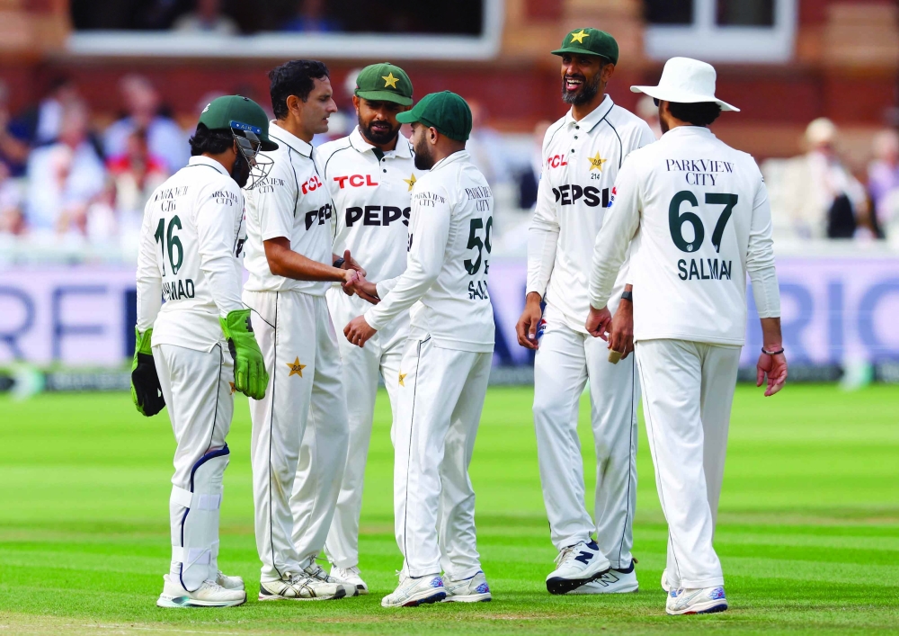 Pakistan's Mohammad Abbas celebrates after taking the wicket of England's Dan Lawrence with teammates during the second Test at Lord's Cricket Ground on August 30. — Reuters