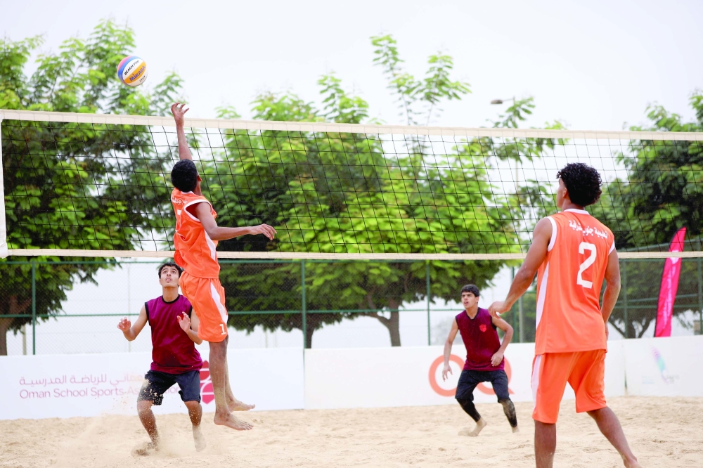 Beach volleyball players in action during the decisive matches.