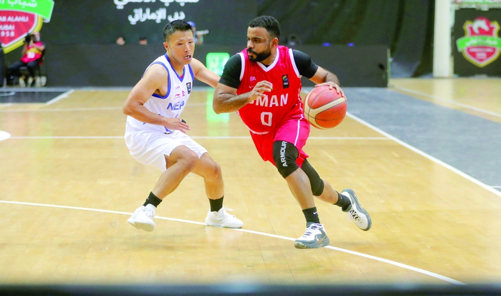 Oman and Nepal players during their final Fiba Asia Cup 2029 Pre-Qualifiers match in Dubai. — Ammar al Musafir