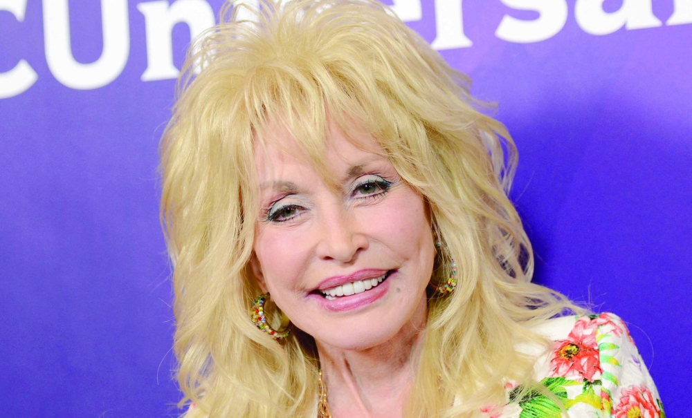 Parton’s extraordinarily successful book project was born from personal anguish: her father grew up unable to read in rural Tennessee. — AFP