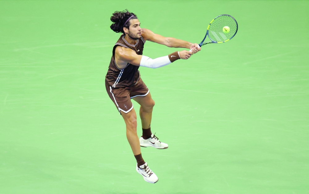 Spain's Carlos Alcaraz in action during his US Open second round match against Portugal's Jaime Faria at Flushing Meadows, New York. — Reuters
