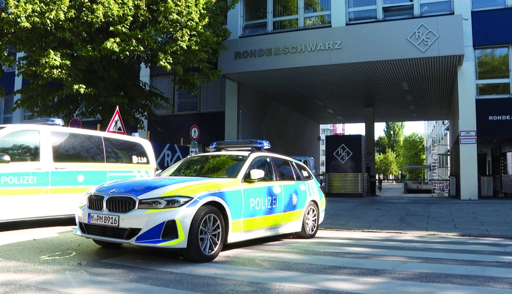 Police secure the area after a suspected politically motivated arson attack on a construction site outside the headquarters of defence tech firm Rohde & Schwarz in Munich. - Reuters