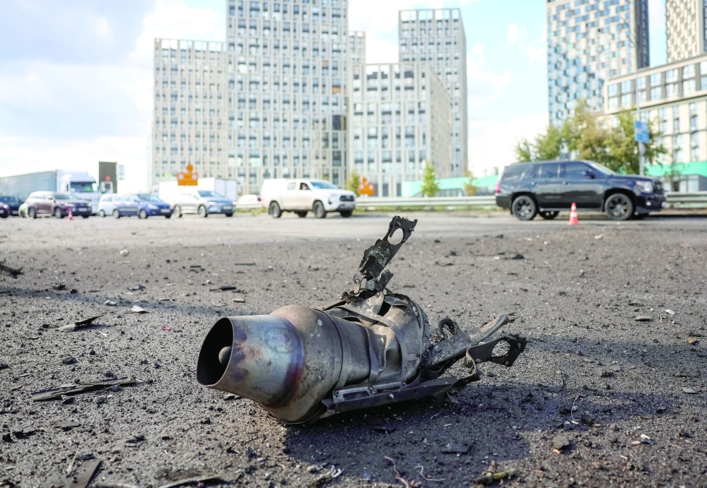 A part of a jet drone lies on the road at the site of a Russian drone strike amid Russia's attack on Ukraine, in Kyiv. - Reuters