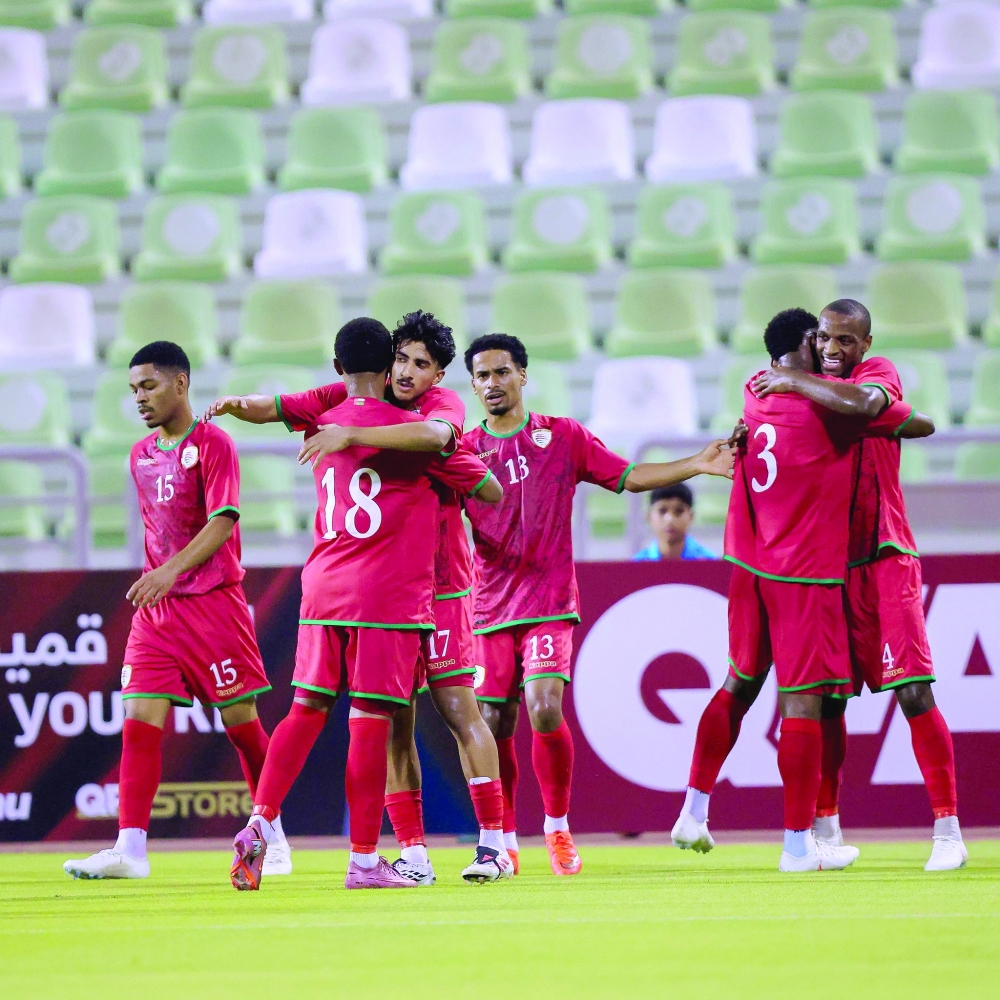 Oman U20 players celebrate a goal during the match against Saudi Arabia in Doha.
