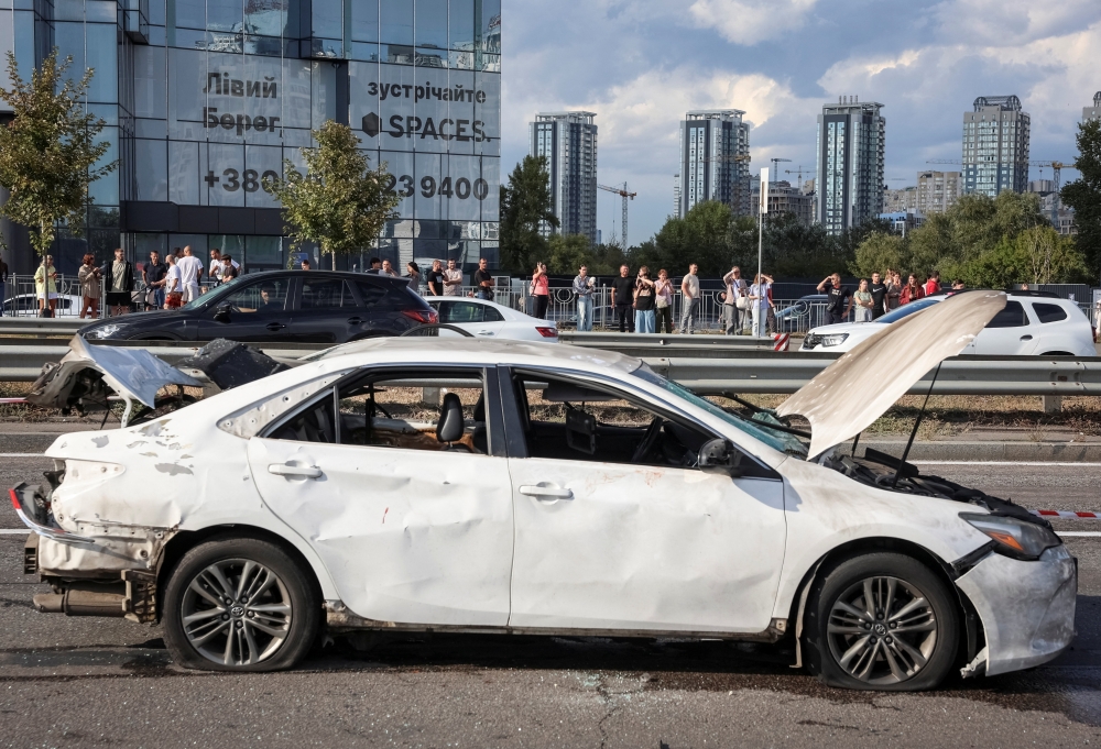 A damaged car at the site of a Russian drone strike, amid Russia's attack on Ukraine, in Kyiv, Ukraine September 3, 2026. REUTERS/Anatolii Stepanov