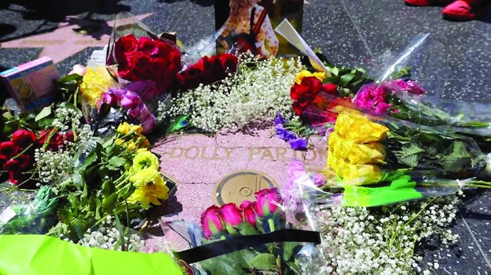 A replacement star honouring Dolly Parton is being installed on the Hollywood Walk of Fame after the original was vandalised— AFP