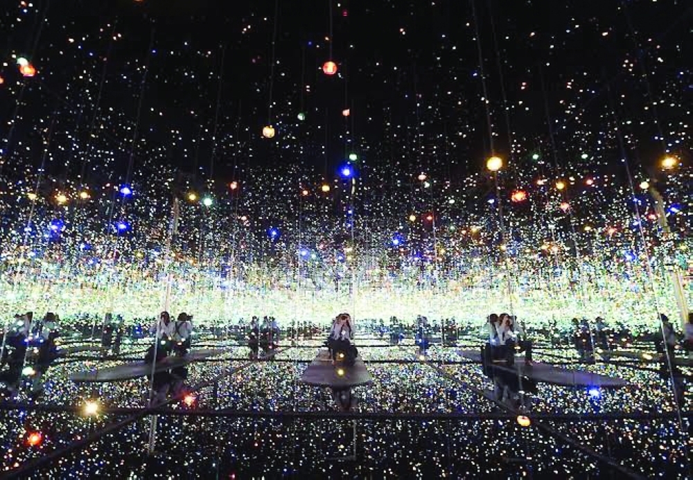 Kusama's kaleidoscopic mirror rooms are a global hit. — AFP