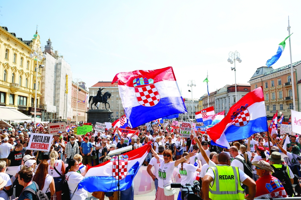 People protest in Zagreb over illegally dumped hazardous waste in the Lika region. — Reuters 