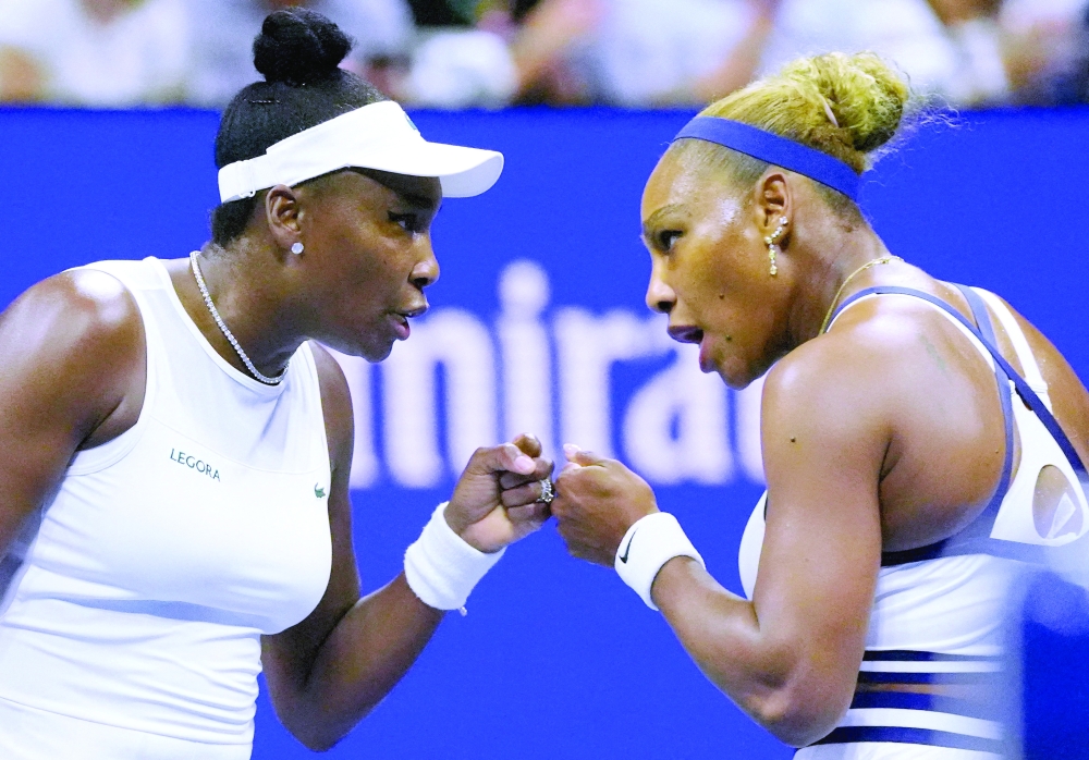 Serena Williams and Venus Williams of the U.S. react during their first round match against Australia's Maya Joint and Taiwan's Chan Hao-ching IMAGN IMAGES