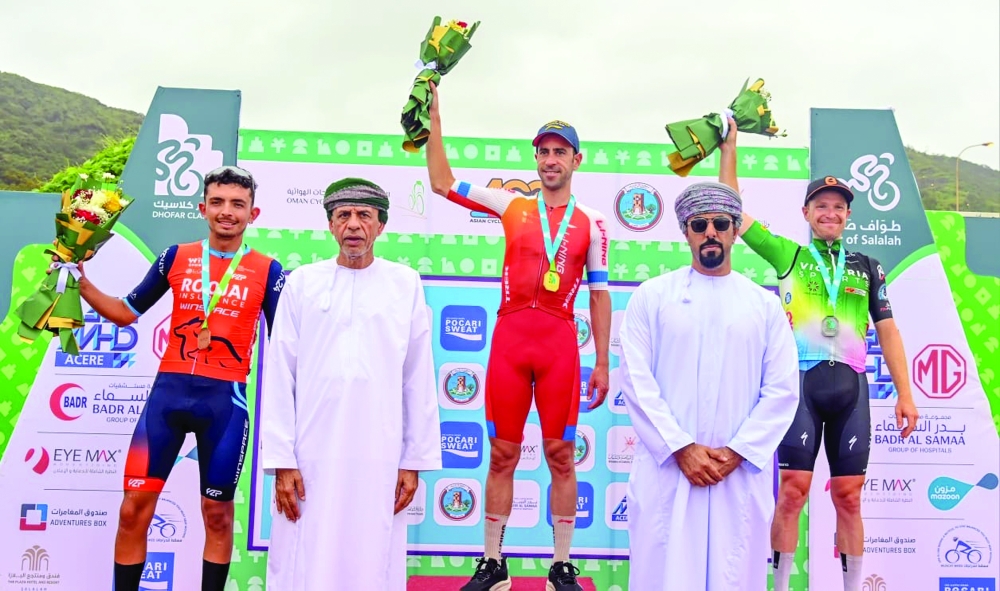 Top three winners of the Dhofar Classic race pose with the officials.