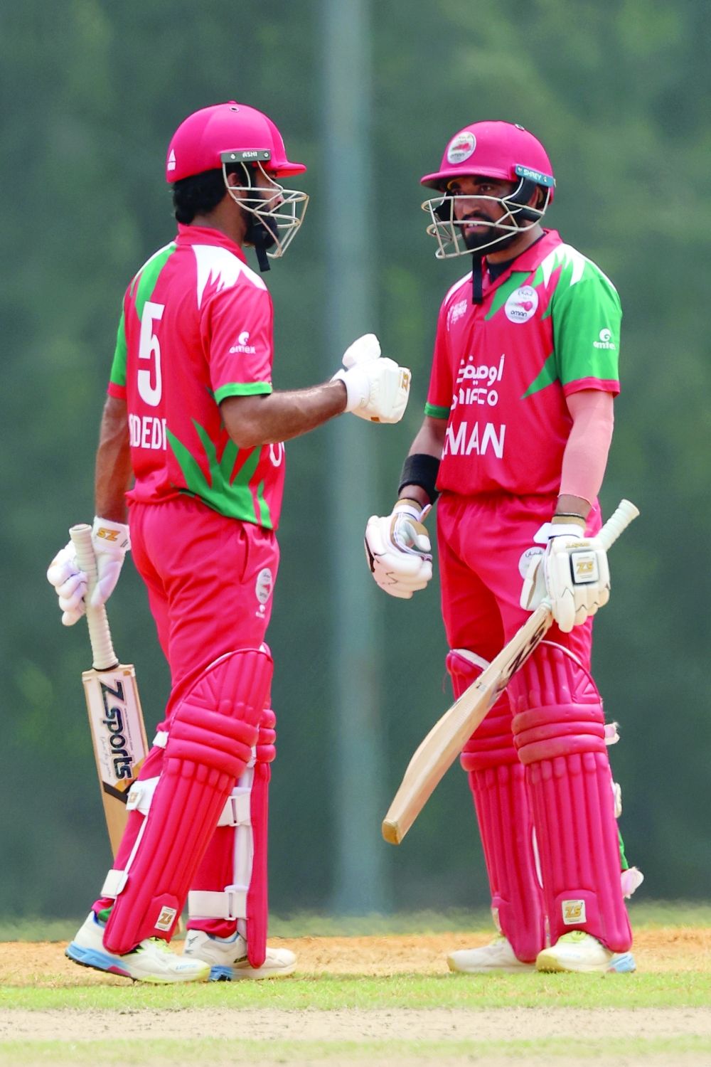 Jiten Ramanandi and Jay Odedra made decent scores for Oman.