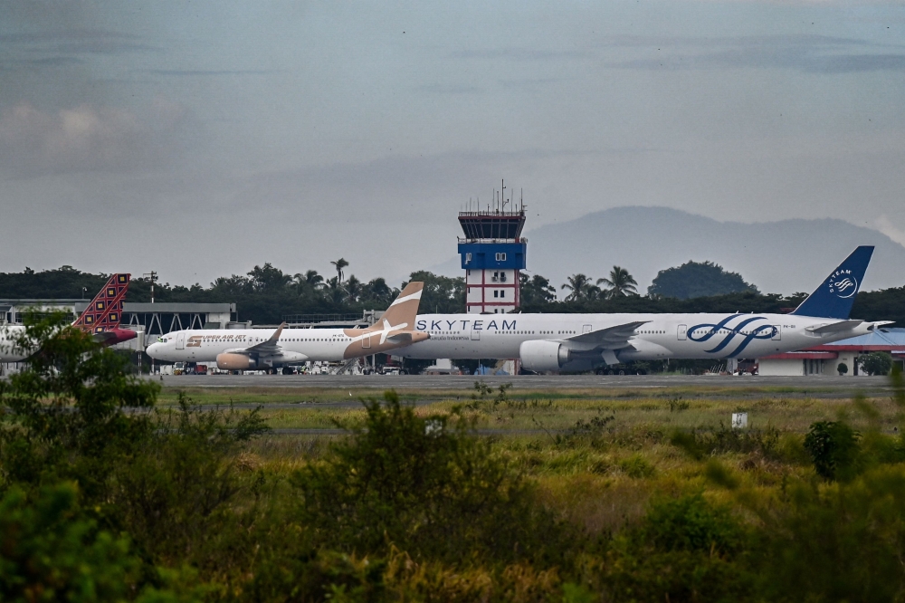 Airplanes sit on the tarmac at Iskandar Muda airport in Blang Bintang on September 6, 2026