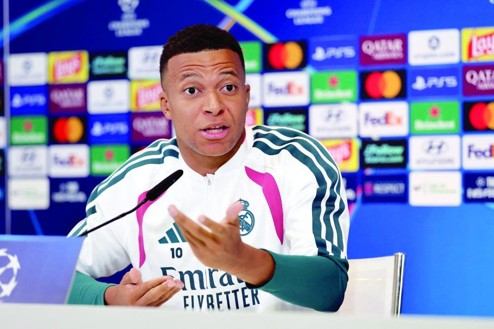 Real Madrid's French forward Kylian Mbappe gives a press conference at the Ciudad Real Madrid training ground in Madrid. — AFP