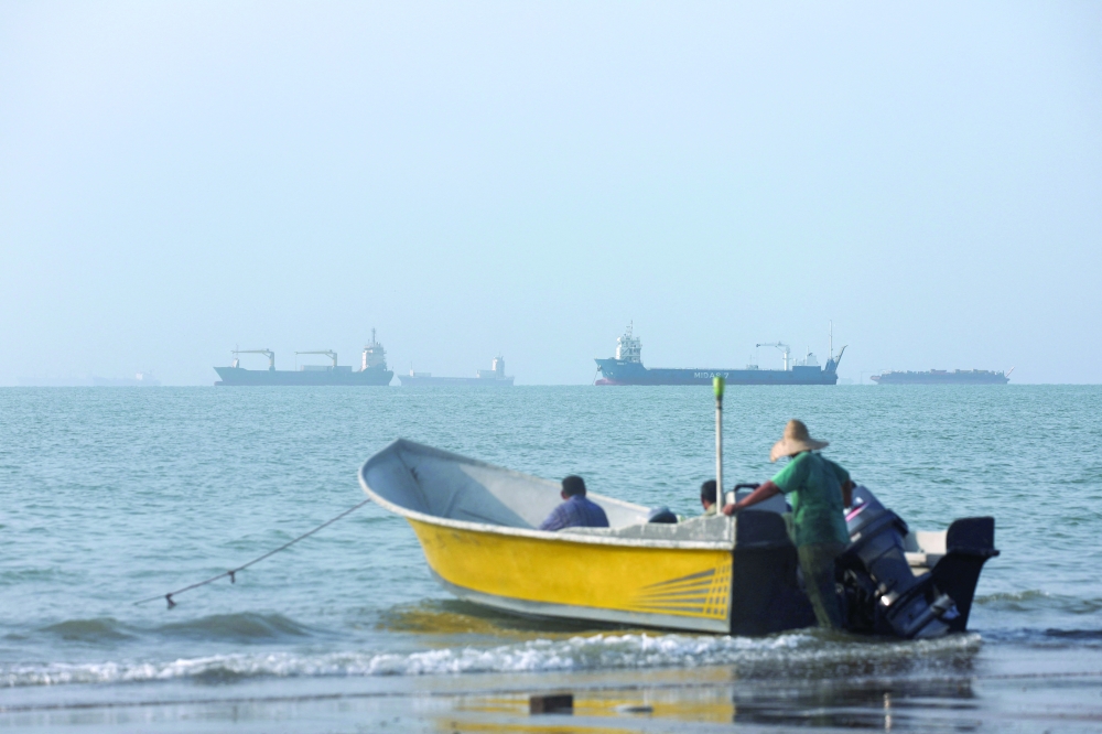 Vessels in the Strait of Hormuz near the beach of Bandar Abbas, Iran. — Reuters 