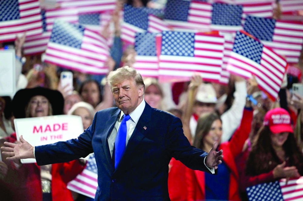US President Donald Trump arrives to speak during the Republican National Midterm Convention at the American Airlines Center in Dallas, Texas on Thursday. — AFP