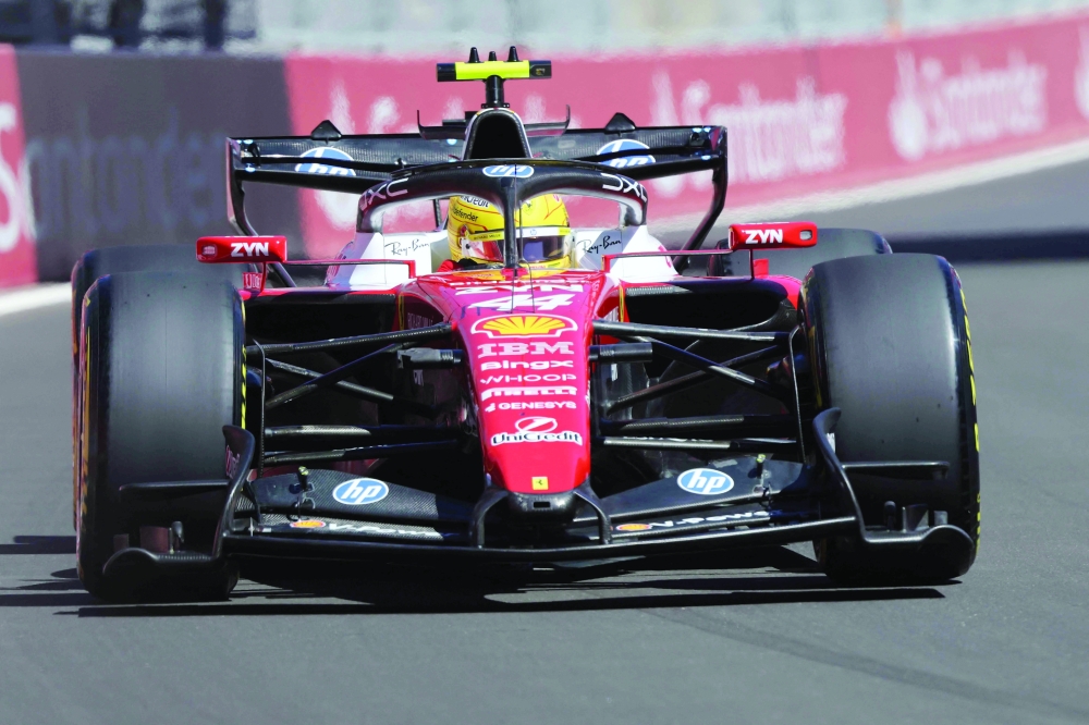 Ferrari's British driver Lewis Hamilton drives during the first practice session at the Madring circuit on September 11, 2026 in Madrid ahead of the Spanish Formula One Grand Prix. (Photo by Thomas COEX / AFP)
