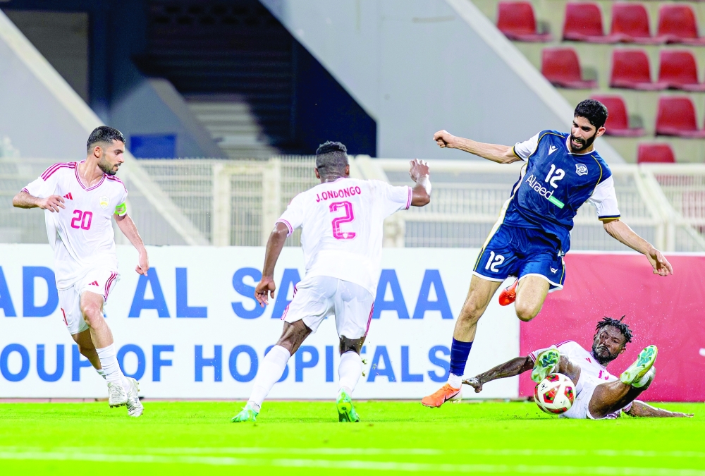 Al Shabab and Oman Club players in action during the third round of the Jindal League at Sultan Qaboos Sports Complex.