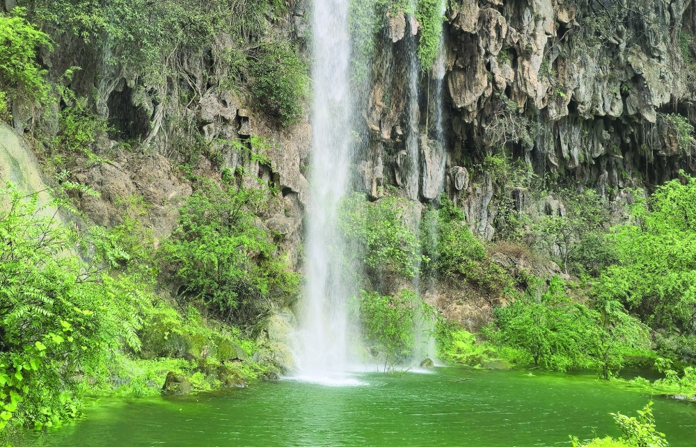 Water poured down from the mountaintop, cascading between the rocks and slopes forming waterfalls that revitalised the wadi after a lull.