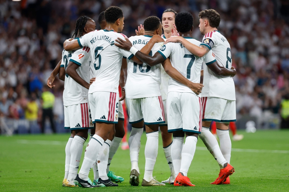  Kylian Mbappe (C) celebrates scoring the opening goal