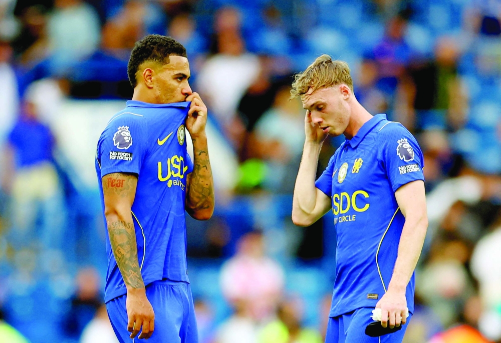 Chelsea's Morgan Rogers and Cole Palmer look dejected after the match. — Reuters
