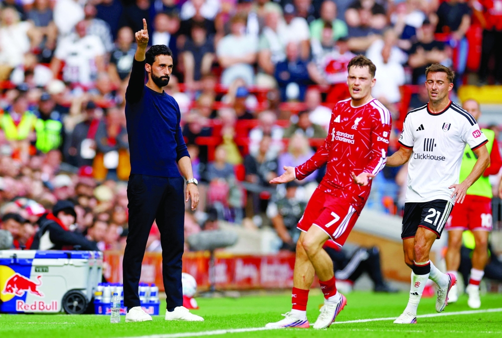 Fulham manager Alvaro Arbeloa and Liverpool's Florian Wirtz react. — Reuters