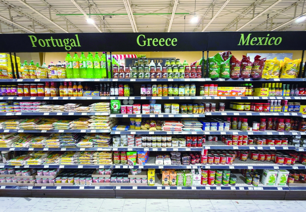 Foods of international origin are displayed on a store shelf as Canadian consumers double down on efforts to buy Canadian goods and boycott US products, at a supermarket in Toronto. - Reuters 