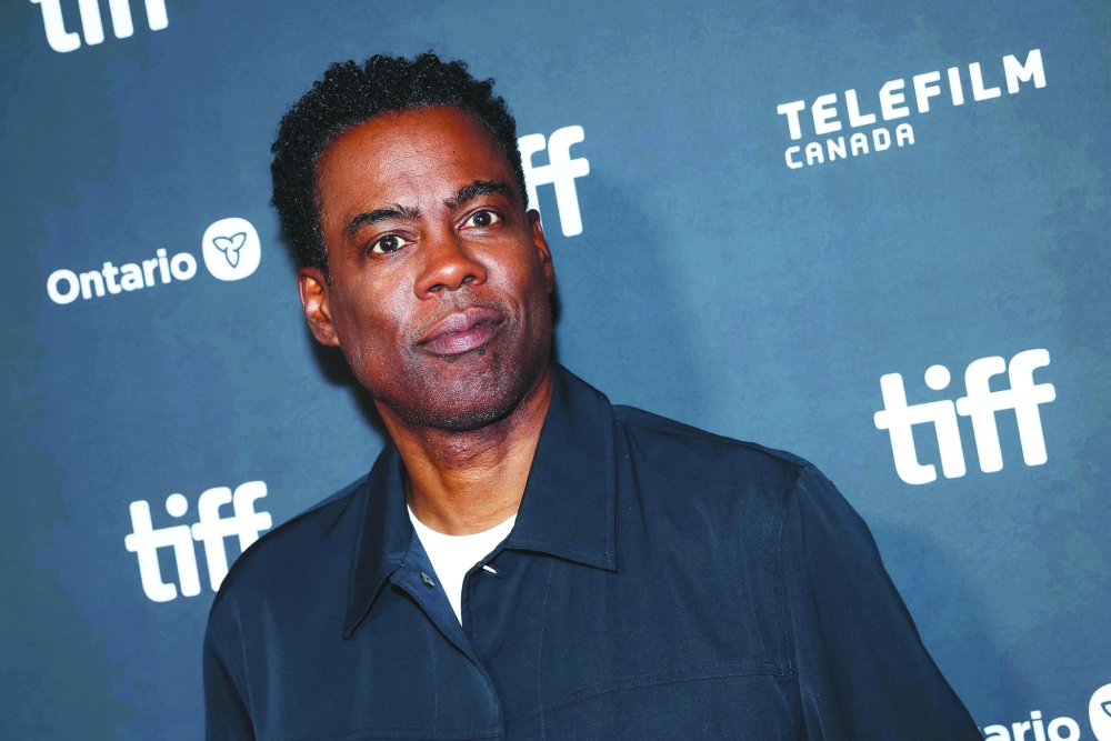 US comedian, actor and film director Chris Rock attends the premiere of his movie "Misty Green" during the Toronto International Film Festival— AFP