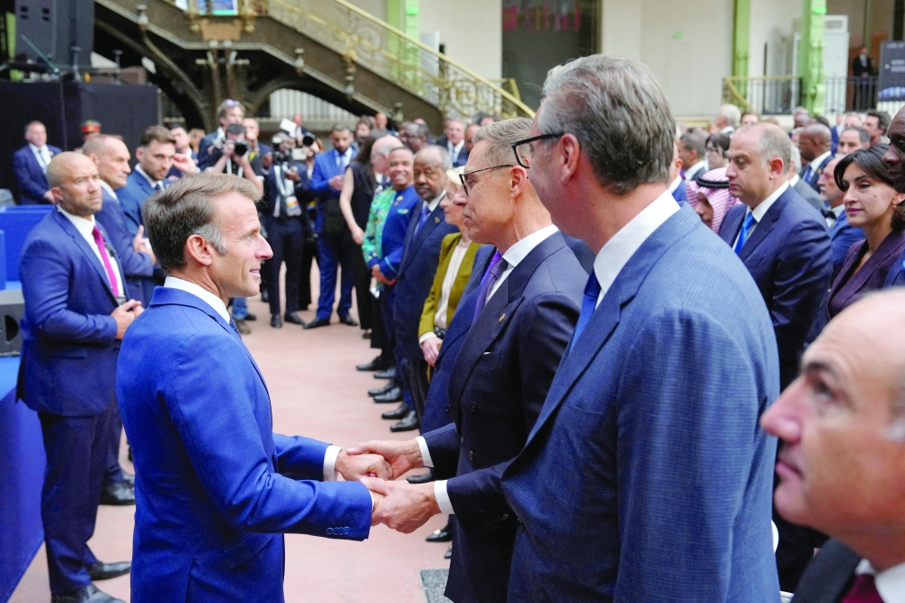 French president Emmanuel Macron with Finland's President Alexander Stubb in Paris. — Reuters File
