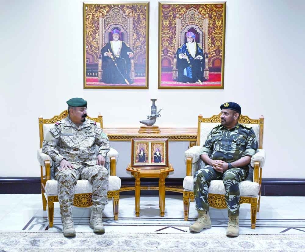 Vice Admiral Abdullah bin Khamis al Raisi holds talks with Air Vice Marshal Mohammed bin Said al Moghedi.