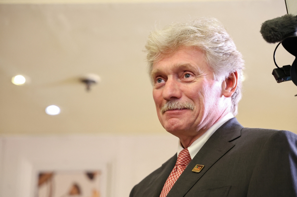 Kremlin spokesman Dmitry Peskov speaks during a meeting of Russian President Vladimir Putin with journalists on the sidelines of the BRICS summit in New Delhi