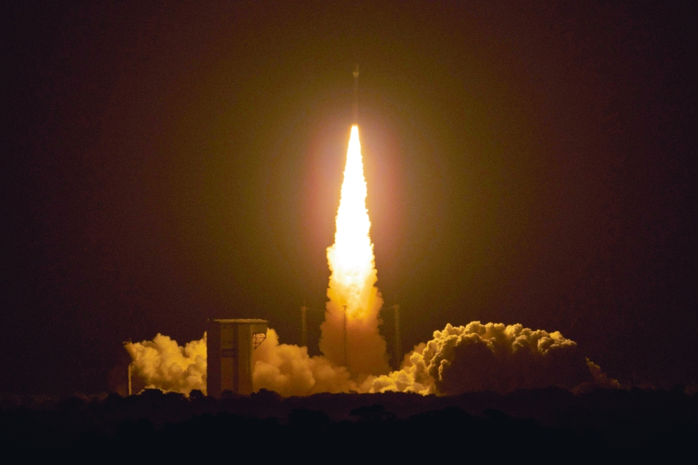 A rocket carrying European satellites lifts off from the Guiana Space Centre in Kourou, French Guiana. The US, Russia and China are working on space weapons, which could include signal jammers to disable satellites. — AFP