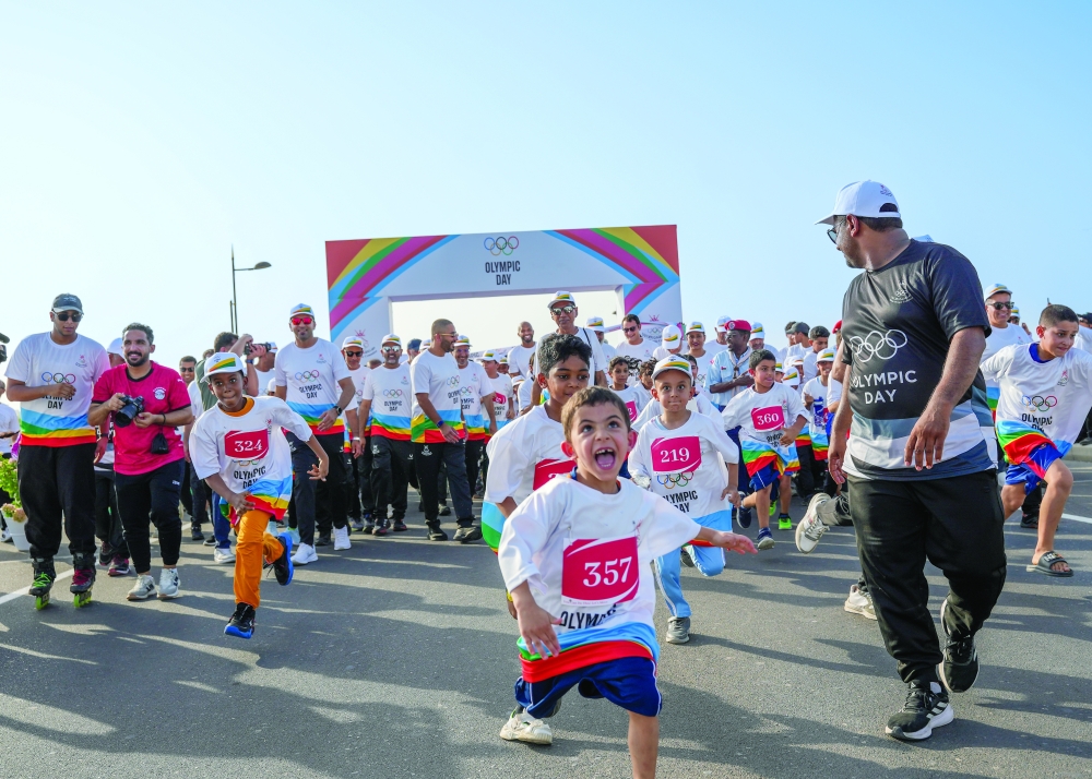 The Olympic Day programme began with a 1.7-kilometre community walk along the waterfront in Al Hail North.