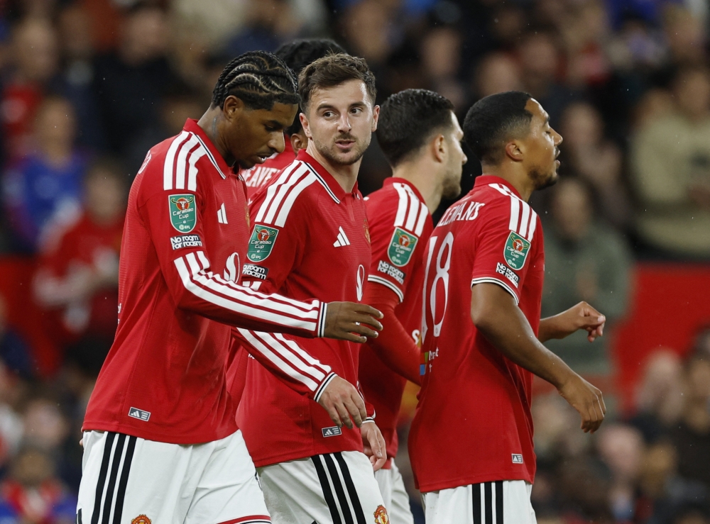  Manchester United's Mason Mount celebrates scoring their second goal with Marcus Rashford  