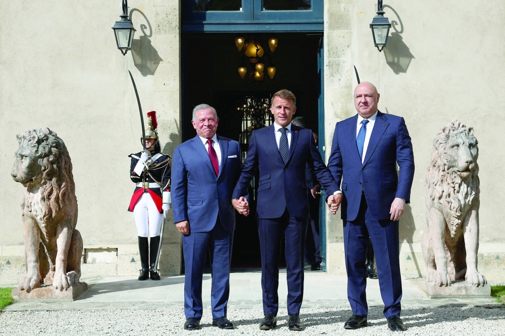 French President Emmanuel Macron, Jordan's King Abdullah II and Lebanese President Joseph Aoun ahead of the opening of the 'Aqaba Process' meeting in support of the Lebanese Armed Forces at the Hotel des Invalides in Paris. — Reuters
